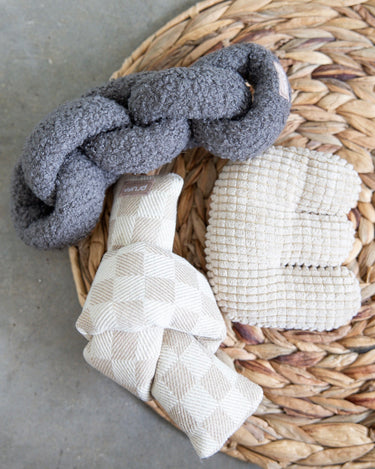 Modern minimalist dog toys. Neutral tone pet toys. 