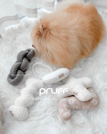 Modern minimalist dog toys. Neutral tone pet toys. 