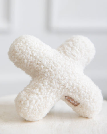 Modern minimalist dog toys. Neutral tone pet toys. 